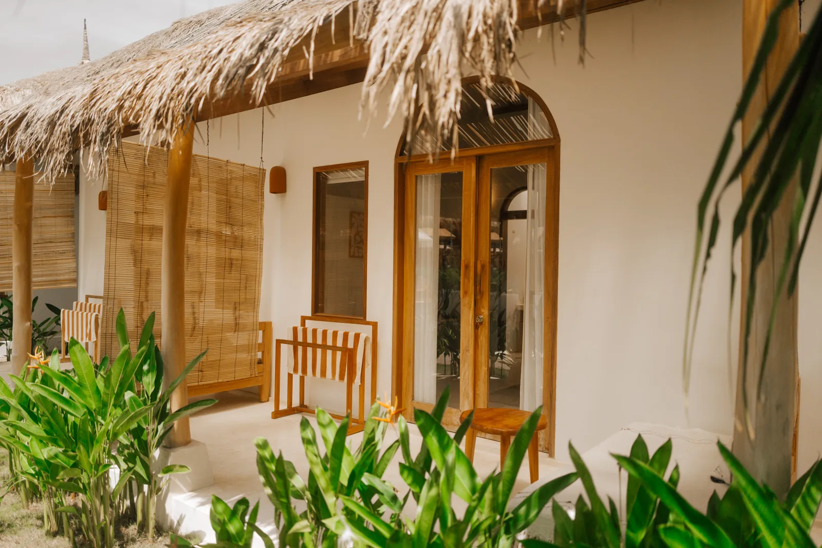 Garden Room at Luana Lombok with double bed and natural materials